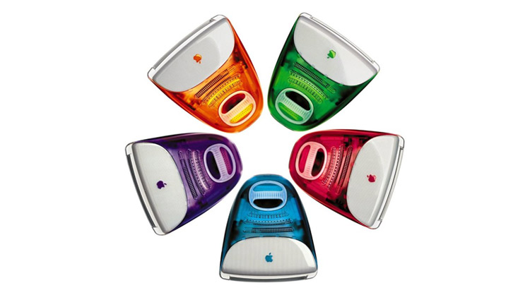 iMac G3の5色展開。オレンジ、緑、紫、赤紫、青の5台が円形に並んだ製品写真